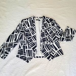 Navy and white genometric, casual, collarless blazer.